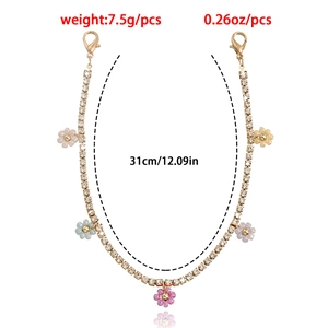 Sparkling rhinestone flower pendant chain for shoes and sandals with gold finish