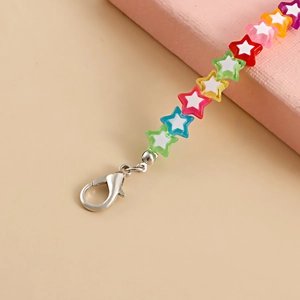 Detail of colorful acrylic star beads with lobster clasp for fashion accessories