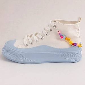 Chunky platform high-top canvas sneakers with colorful beaded charms and heart icons