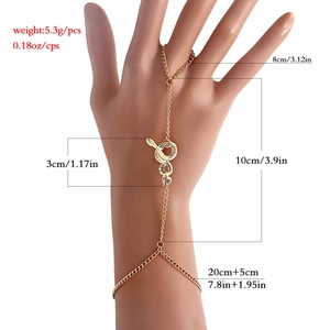 Goldenes Schlangen Fingerarmband im Punk Stil mit Herzanhängern und Kunstperlen