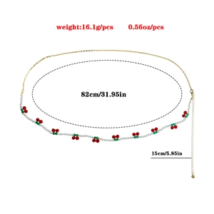 Chaîne de taille bohème en perles fantaisie avec breloques cerises et fermoir mousqueton