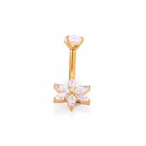 Piercing ombelico in titanio G23 dorato con fiore di zircone su sfondo bianco puro