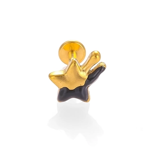 Macro shot of 316L gold star labret with black enamel drip effect on a flat back stud