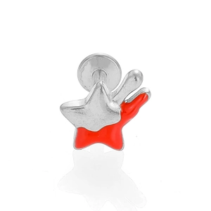 Macro detail of star-shaped 316L stainless steel labret stud with red enamel finish