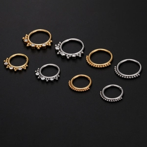 316L stainless steel nose and cartilage rings set with cubic zirconia in gold and silver