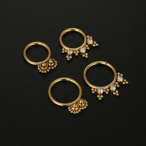 Set of four 16G gold stainless steel septum rings with zircon stones and beaded accents