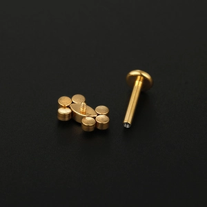 F136 Titanium flat back labret stud with golden marquise zircon top for lip and ear piercings