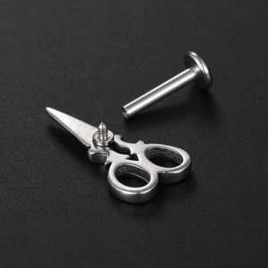 16G stainless steel labret stud featuring a unique silver vintage scissor design