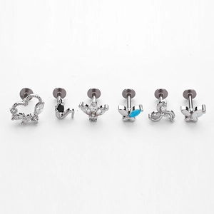 Dettagli di set da 6 piercing con farfalla in zircone, cuore e motivi a serpente