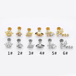 Labret-set van titaniumstaal met zirkonia vlinder en kronen in goud en zilver