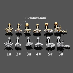 Détail de piercings d'oreille en acier inoxydable 1,2x6 mm avec zircons et fermoirs à boule