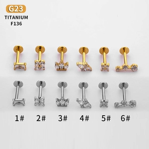 F136 Titanium labret studs set with cubic zirconia in crown and flower shapes