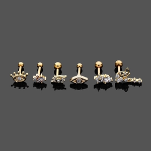 Lot de six studs labret en acier chirurgical doré avec zircones aux designs variés