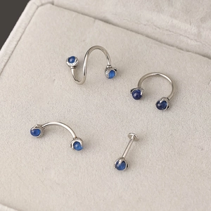 316L stainless steel piercing set with blue opal stones and dragon claw setting