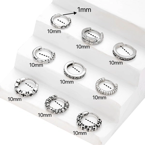 Set of 9 vintage punk stainless steel huggie hoop earrings with gothic skull and cross motifs