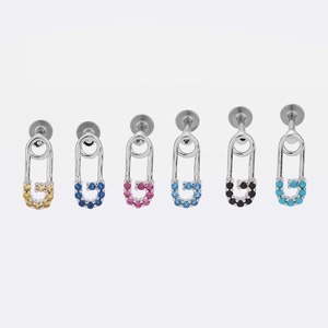 Detail view of six 316L stainless steel safety pin earrings with colorful zircon stones