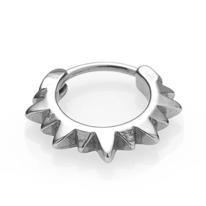 Macro shot of silver punk spike hoop earring in vintage stainless steel finish