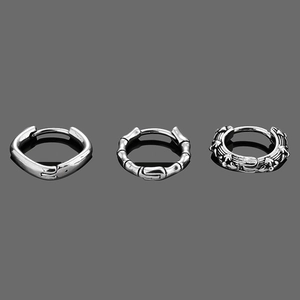 Detailed views of smooth, bamboo-jointed, and gothic engraved stainless steel hoop earrings