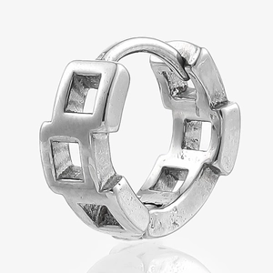 Detailed macro view of silver stainless steel square link earring with polished finish