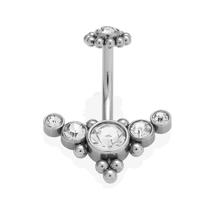 Macro detail of 316L stainless steel navel ring with zircon flower cluster design