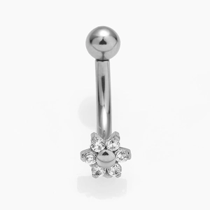 Detail of flower curved eyebrow ring with cubic zirconia petals and steel barbell