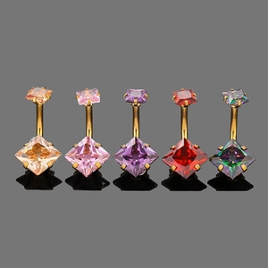 Detail of five colored square zircon navel rings with gold plated stainless steel bars