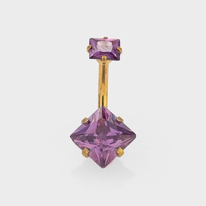 Macro detail of gold belly ring featuring square purple zircon stones in claw setting
