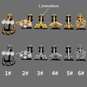 Set de 12 piercings labret de acero 316L con circonitas en tonos dorados y plateados