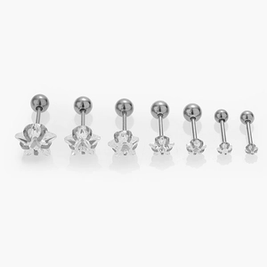 Macro shot of seven different sized 316L stainless steel star zircon ear studs