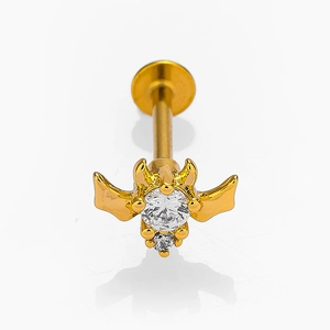Piercing labret in acciaio 316L dorato con ali di demone e cristallo zircone