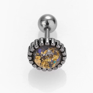 Macro shot of gear-edge opal piercing stud with gold foil inlay and ball back screw
