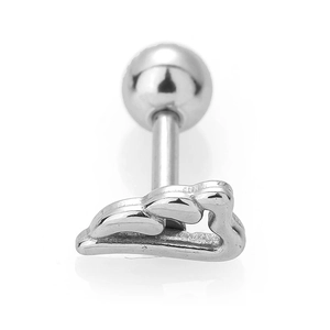 Macro shot of silver heart-shaped stainless steel piercing stud with ball back