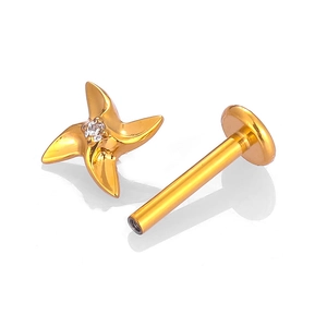 F136 titanium labret earring with gold star design and center marquise zircon