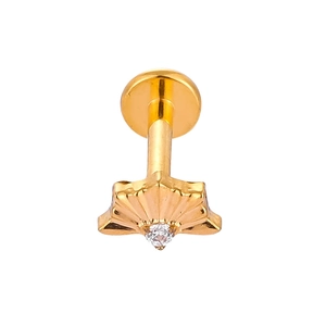 Detailed view of a gold-plated titanium flat back labret with a star-shaped marquise zircon