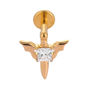 Macro detail of F136 titanium gold dagger wing earring with inlaid square zircon