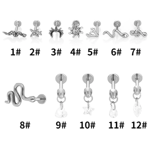 Set de 12 piercings labret y cartílago en acero 316L con colgantes de cristal