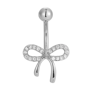 Detailed view of silver bow belly ring with cubic zirconia inlay on a curved barbell