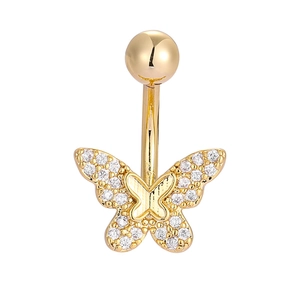 Detailed macro view of golden bow butterfly navel ring with sparkling white zircons