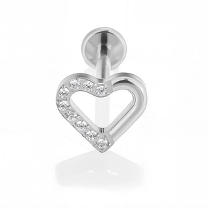 Macro shot of F136 titanium labret stud with heart design and micro-set zircon crystals