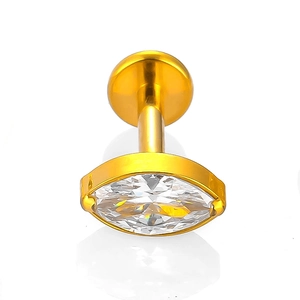 Macro view of gold F136 titanium labret stud with marquise-cut sparkling zircon