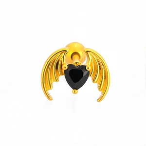 Detailed view of heart-shaped bat wing ear stud with black zircon and gold plating