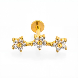 Labret de acero 316L con tres flores de circonita dorada y base plana para oreja