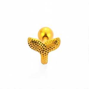 Macro shot of gold fish tail cartilage stud with honeycomb texture and screw back