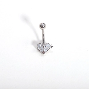 Detailed macro view of heart-shaped navel piercing with marquise and round cubic zirconia