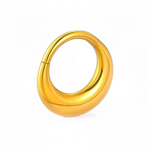 Macro detail of high-polished gold stainless steel seamless hoop with waterdrop design