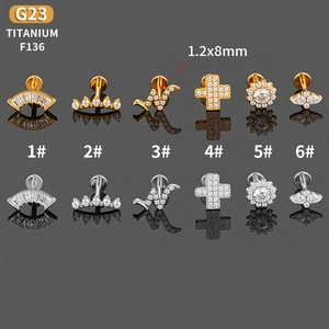 G23 Titanium labret piercingset met zirkonia in goudkleurige en zilveren afwerking