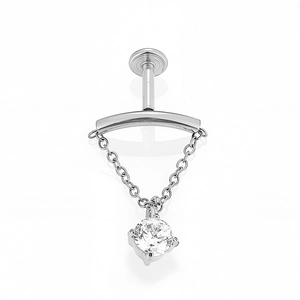 Detail of 316L stainless steel labret stud with hanging chain and zircon stone