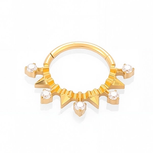 Detailed view of G23 titanium gold clicker ring with spikes and clear zircon stones