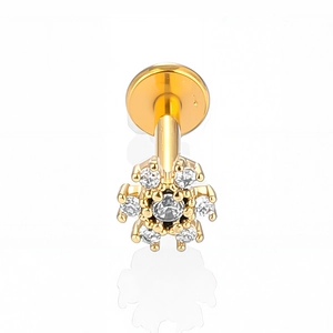 Detailed macro view of a 316L stainless steel flower labret with shiny white zircon stones