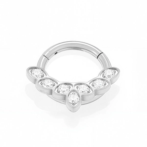 Macro view of G23 titanium clicker hoop with five sparkling zircon stones in scalloped setting